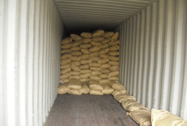 Humic acid products in kraft paper bags loaded into a container